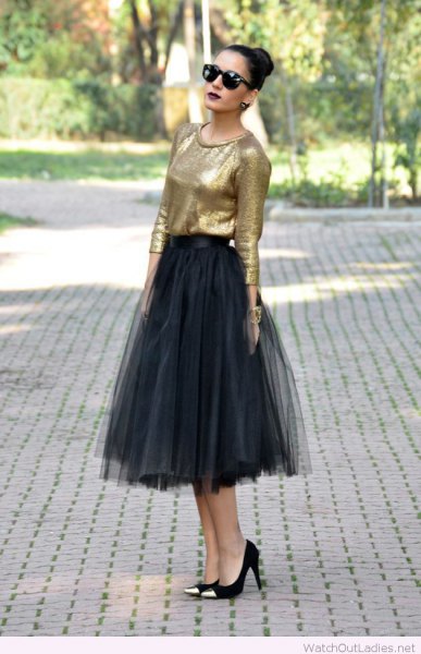golden blouse with black midi tulle skirt