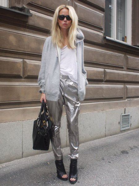 gray hooded cardigan with silver metal trousers