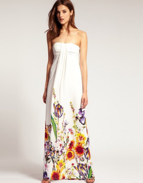white maxi strapless dress with colorful floral printed details