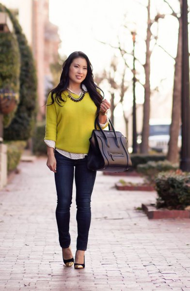 yellow sweater with white and black polka dot shirt