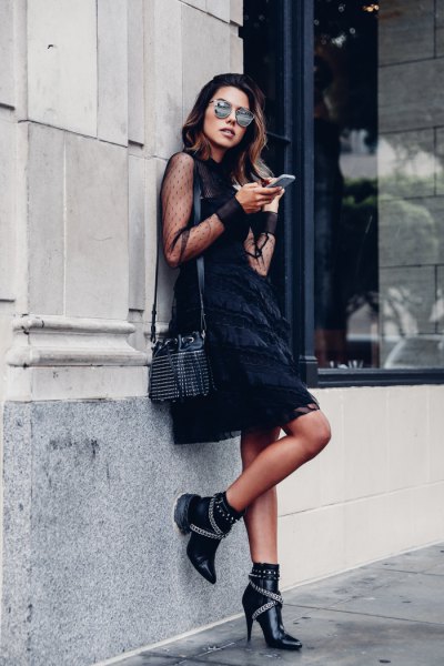 black semi-pure mini swing dress with leather-covered short boots