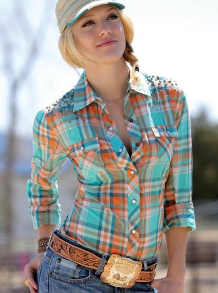 gold cowboy belt with orange and pink checkered shirt