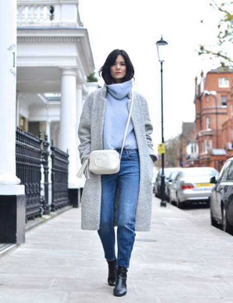 light blue sweater with cabbage neck with gray wool coat and jeans