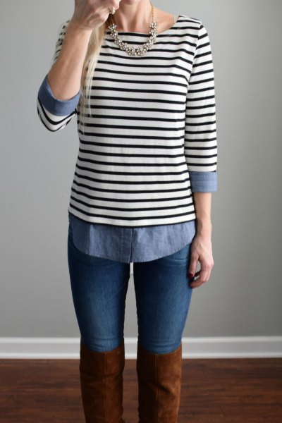 black and white striped boat neck top with chambray shirt and high thigh boots