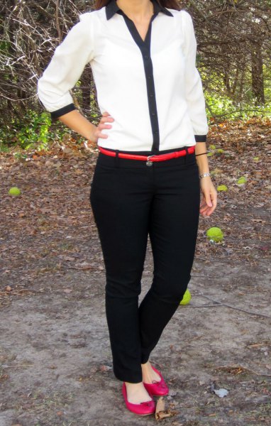 white and black shirt with chinos and narrow belt