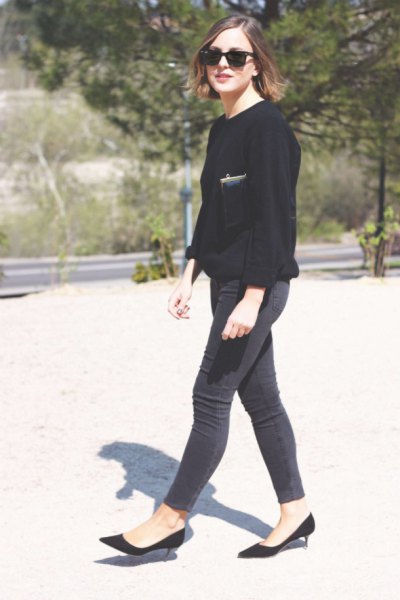 black sweater and slim jeans