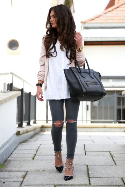 light pink bomber jacket with white shirt and black cat heels