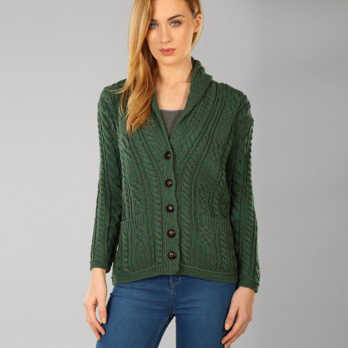 dark green cable knit sweater with unwashed blue skinny jeans