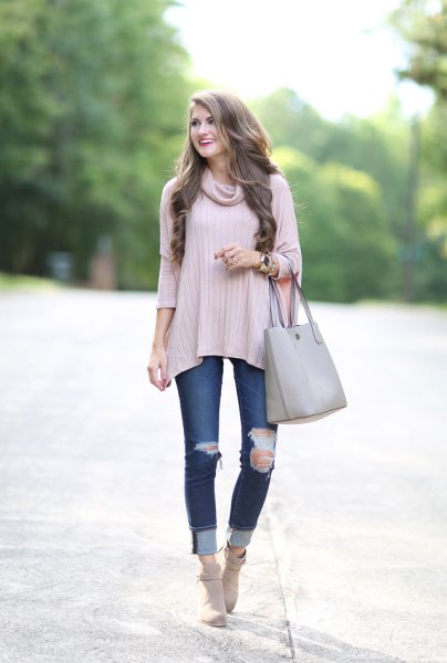 light pink ribbed poncho shirt with ribbed cuffed jeans