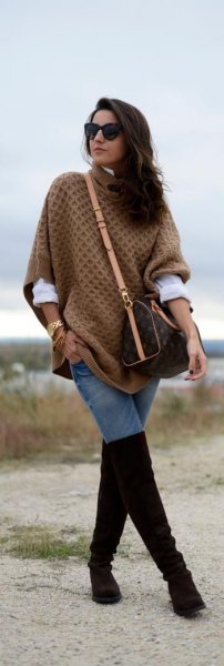 green knitted poncho shirt with black thigh high boots