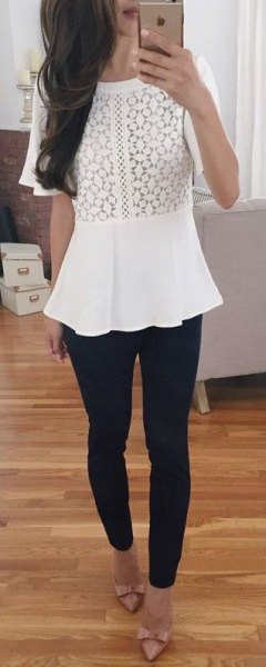white peplum top with black skinny jeans and strap heels