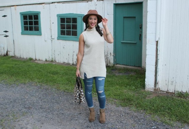 white sleeveless suede ribbed tunic sweater with brown hat