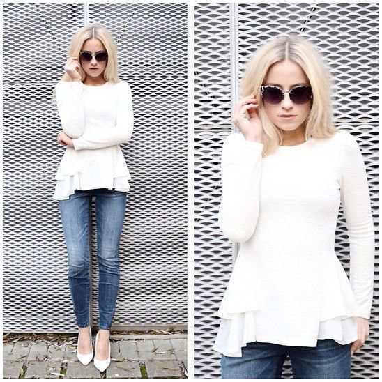 white peplum sweater with ruffled blouse and jeans