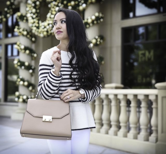 white and black striped sweater with pink leather bags