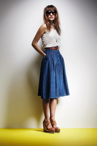 white and pink polka dot vest top with blue pleated knee length denim skirt