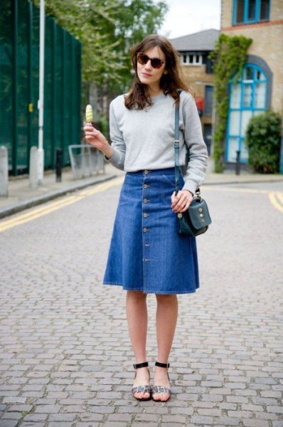 gray sweater with blue denim knee-length skirt
