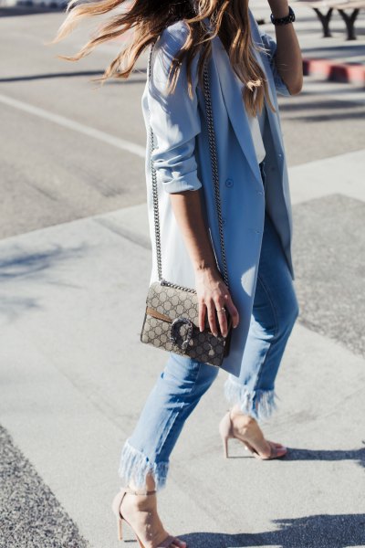 Sky blue long blazer with fringed jeans