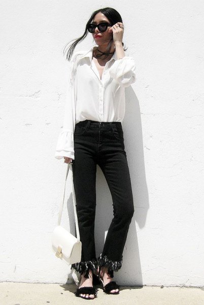 black fringed jeans with white button up bell neck shirt