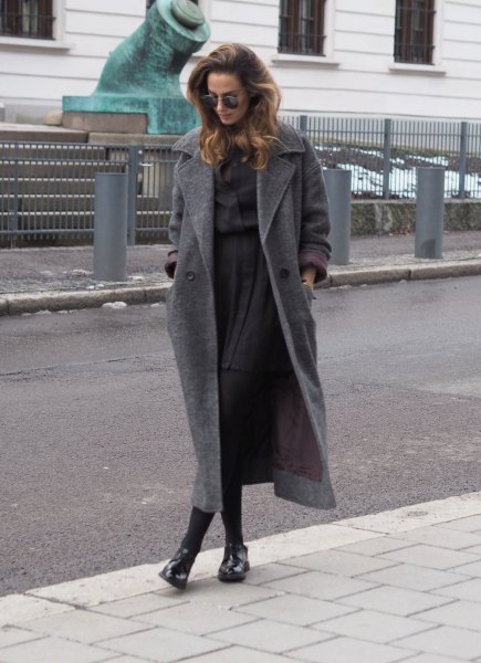 gray wool maxi jacket with button up shirt and pleated miniskirt