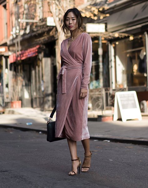 light pink midi velvet wrap dress with black briefcase and heels