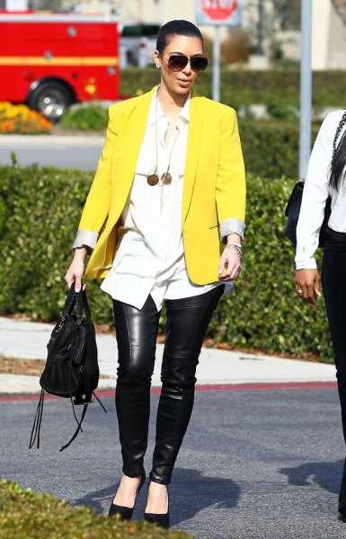 yellow blazer with white boyfriend shirt and leather pants