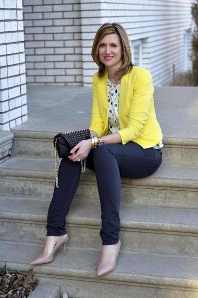 multicolor polka dot blouse and blue jeans
