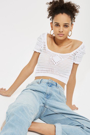 white crochet lace cropped top with light blue boyfriend jeans