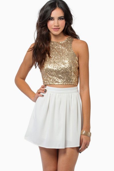 pink gold sequin cropped vest top with white mini skater dress