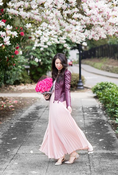 blush pink maxi pleated deferred dress with black leather jacket