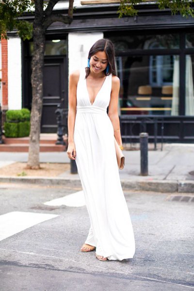 white deep v-neck gathered midi dress with silver heels