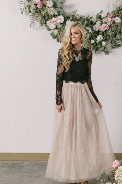 black peeled top in lace case with light pink tulle floor length skirt