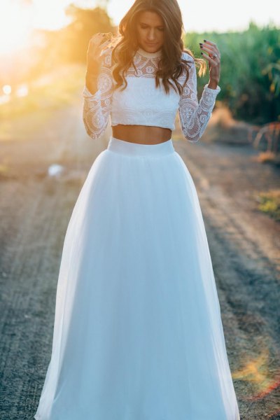 white lace cropped blouse with long waist long white tulle skirt