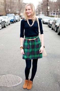 black half-heated tee with green and navy checkered mini skirt