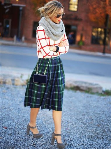 green plaid skirt with red and white sweater