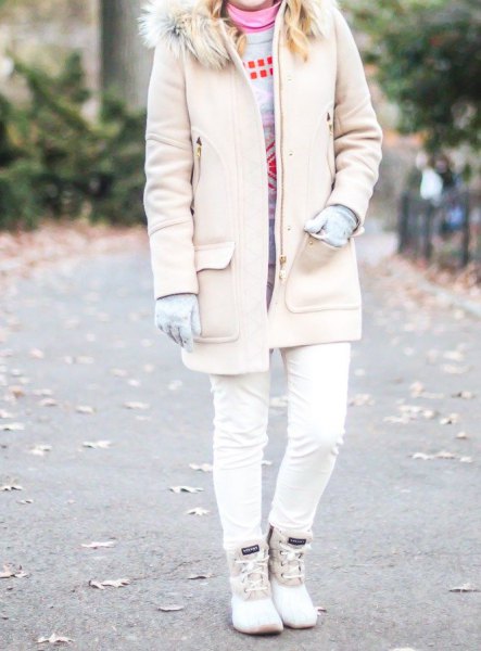 light pink faux fur collar long jacket with skinny jeans and white duck boots