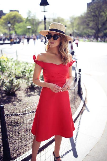 red strapless dress straw hat