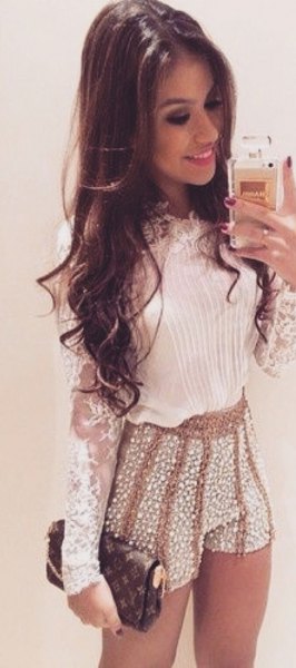white lace long-sleeved blouse with pink sequins mini shorts
