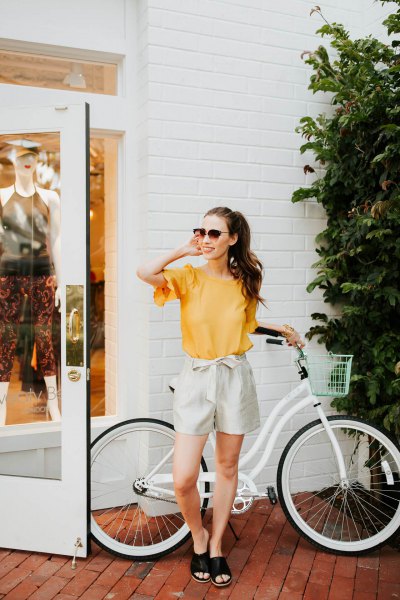 yellow bell-sleeved chiffon top with ivory ribbon dress shorts
