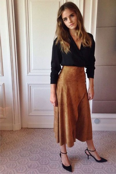 black v-neck long-sleeved blouse with brown suede maxi extended skirt