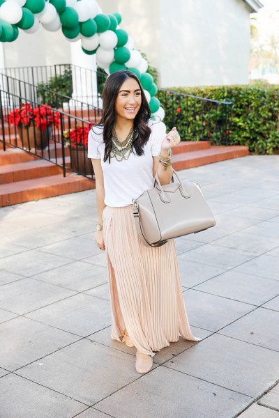 white t-shirt with pink pleated maxi skirt