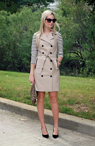 black and white striped long sleeve tee with light pink belt sleeveless trench coat