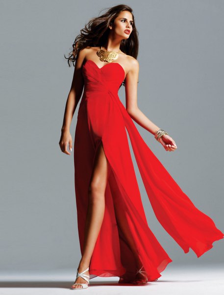 red high split floor length dress with statement necklace