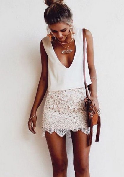 white sleeveless plunging neckline in lace dress in two parts