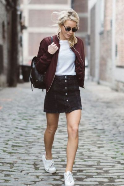 burgundy bomber jacket with black denim mini skirt