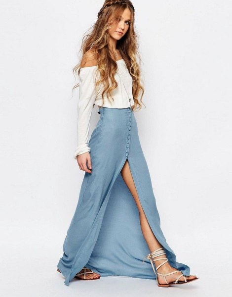 white from the blouse with blue high split denim maxi dress