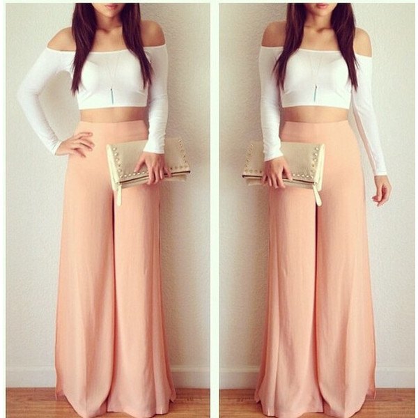 pink trousers with white off the shoulder cropped shape fitting top