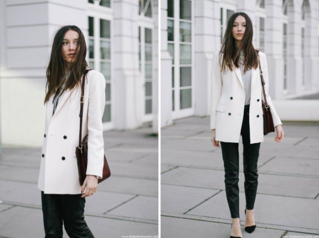 white double breasted long blazer with gray sweater black jeans