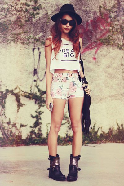 white cropped sleeveless top and floral shorts