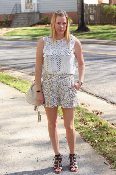 white polka dot ruffle sleeveless top and floral shorts