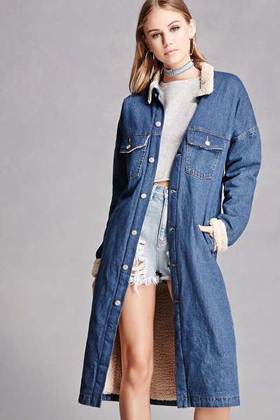 blue long sleeve jacket with cropped sweater and shorts